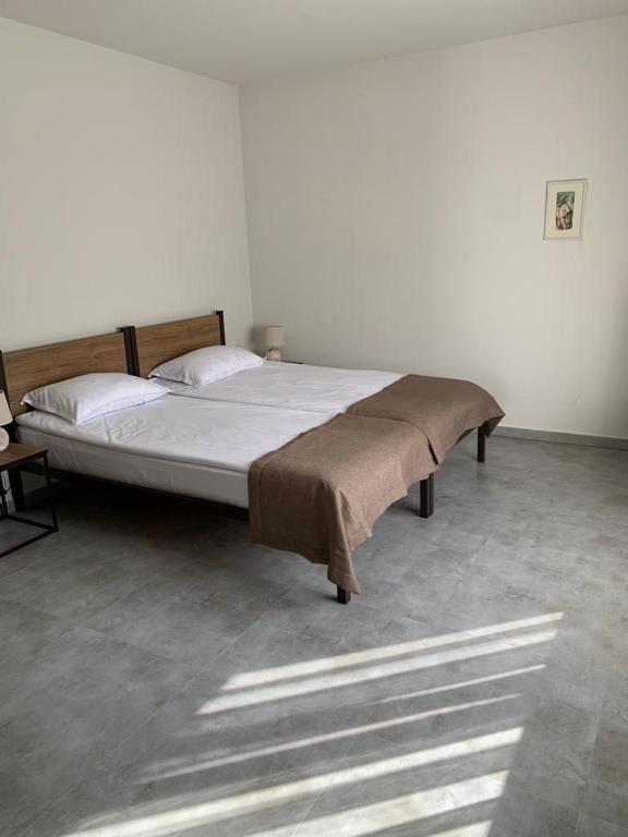 Postel nebo postele na pokoji v ubytování NorDar
