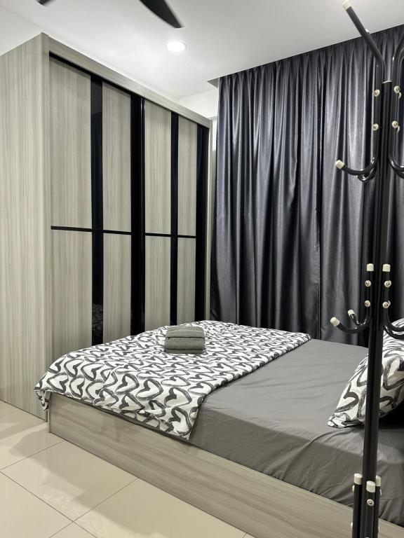 Postel nebo postele na pokoji v ubytování Apartment Melaka City