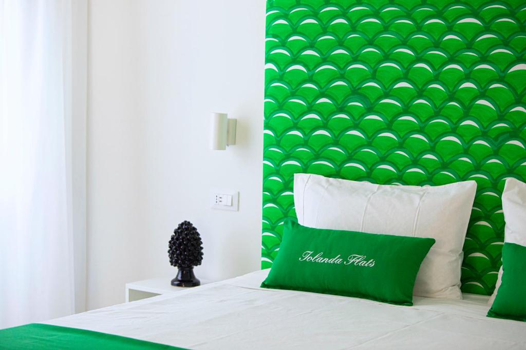 Postel nebo postele na pokoji v ubytování Iolanda flats