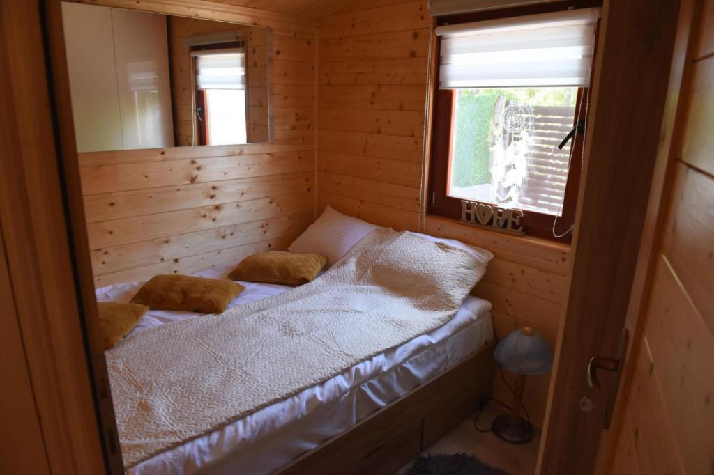 Postel nebo postele na pokoji v ubytování VIEW and VIBE Jagodina