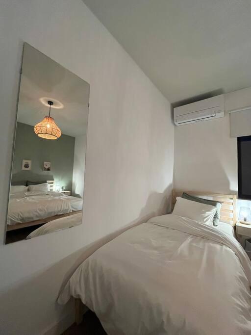 Postel nebo postele na pokoji v ubytování Boldermountain Guesthouse