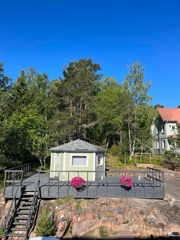 a tiny house on top of a hill at Hortensia in Mariehamn