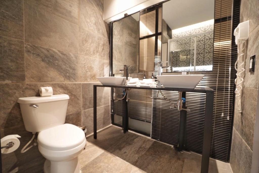 Koupelna v ubytování Ontico Urban Design Hotel