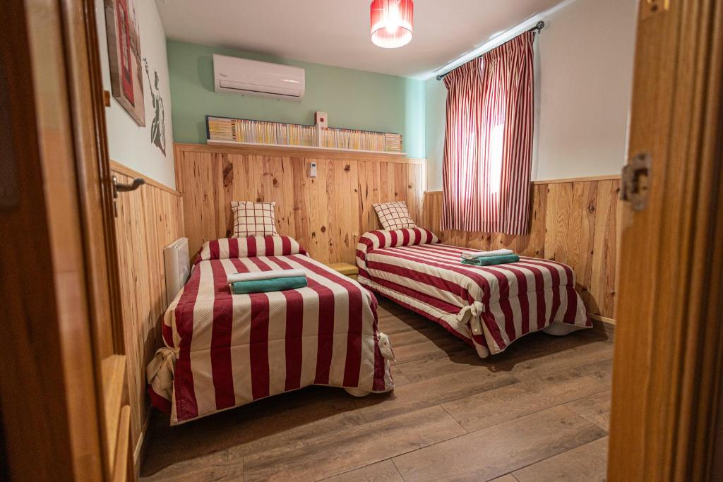 Postel nebo postele na pokoji v ubytování Casa El tio Daniel,,,,,,ahora con SPA