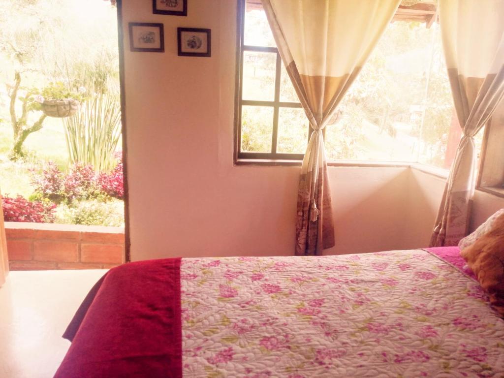 Postel nebo postele na pokoji v ubytování Finca Hotel Nutabes