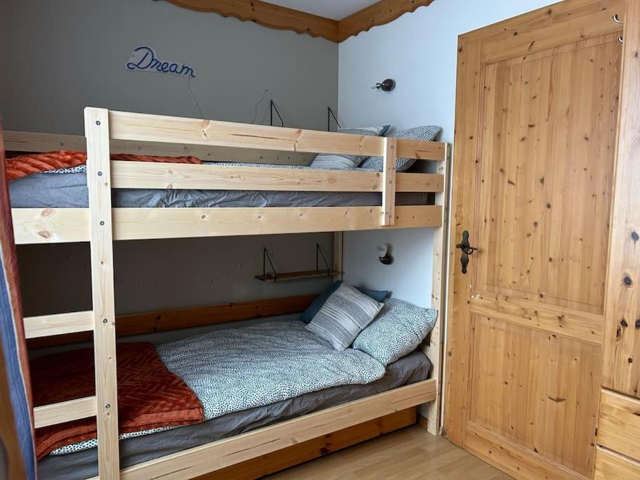 a couple of bunk beds in a room at Kreischberg-Blick in Lutzmannsdorf