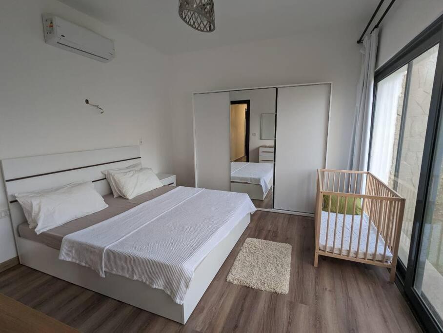 Postel nebo postele na pokoji v ubytování Somabay Retreat 2BR Apartment