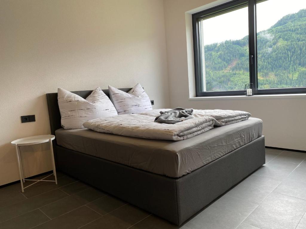 Postel nebo postele na pokoji v ubytování Apart Zangerle