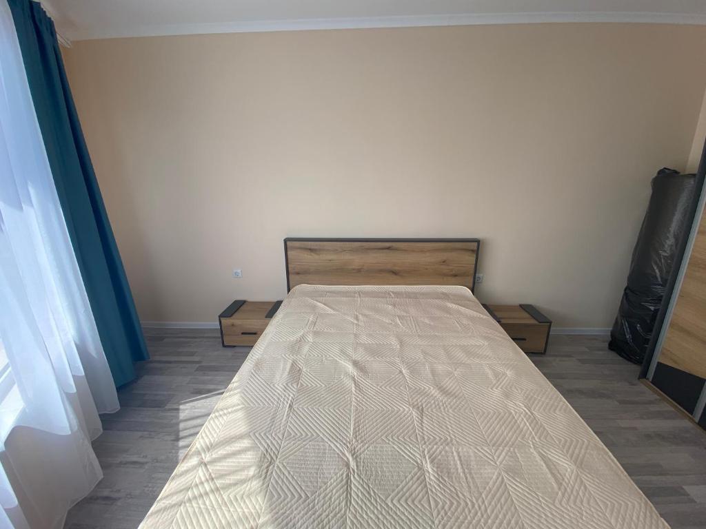 a bedroom with a bed in a room at MARINA BAY 23 Sveti Vlas Beach in Sveti Vlas