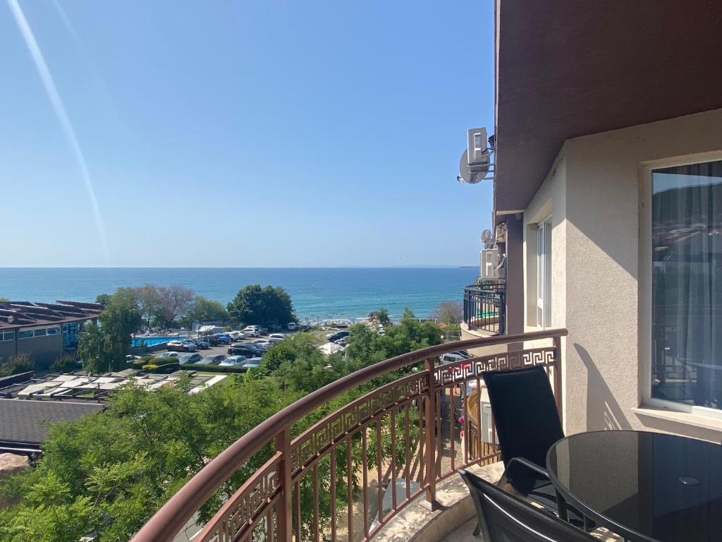a balcony of a building with a view of the ocean at MARINA BAY 23 Sveti Vlas Beach in Sveti Vlas