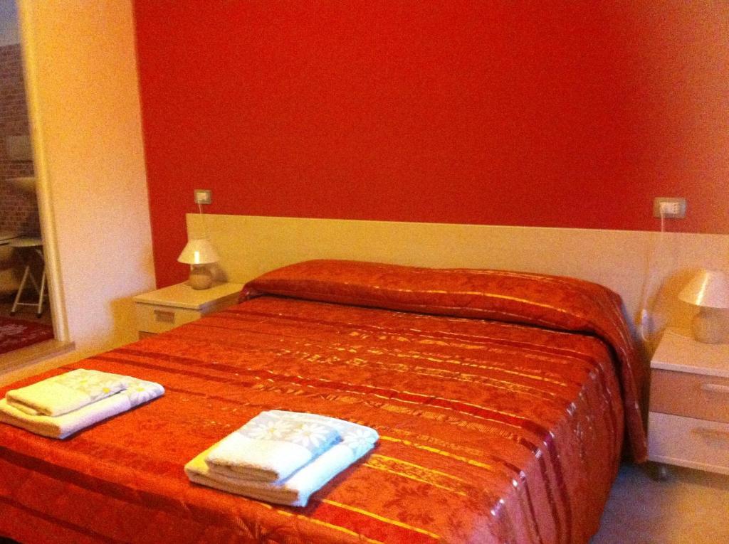 Postel nebo postele na pokoji v ubytování B&B Casa Mia
