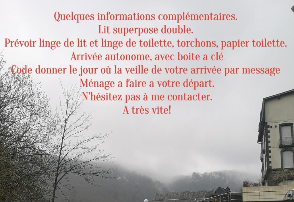 a poem with a picture of a building and a tree at Appartement idéalement situé in Le Mont-Dore