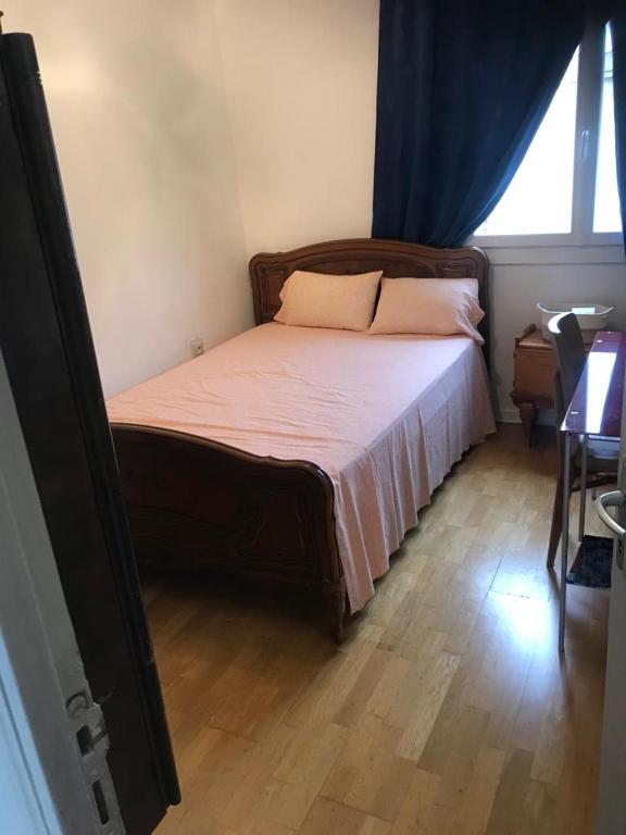 Postel nebo postele na pokoji v ubytování Beauvais chambre 1