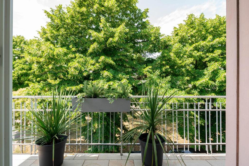 A balcony or terrace at Officine Cavour - Appartamenti la Quercia