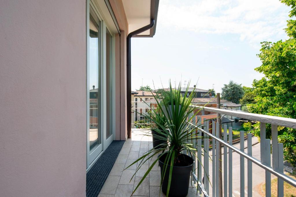 A balcony or terrace at Officine Cavour - Appartamenti la Quercia