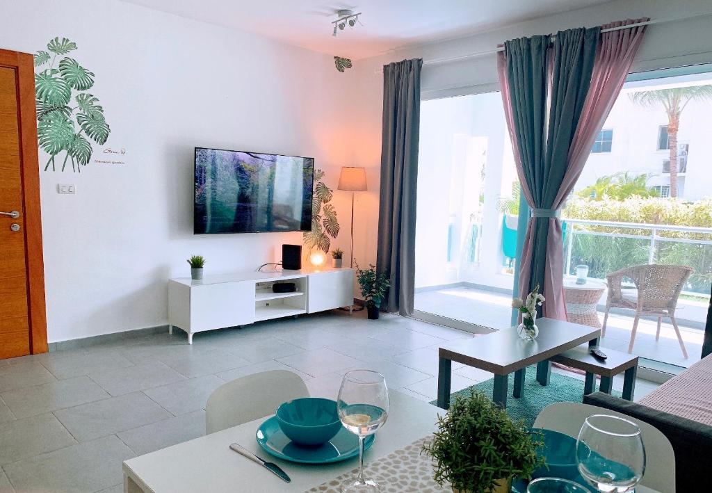 TV a/nebo společenská místnost v ubytování Apartment in Estrella, Dominicus-Bayahibe