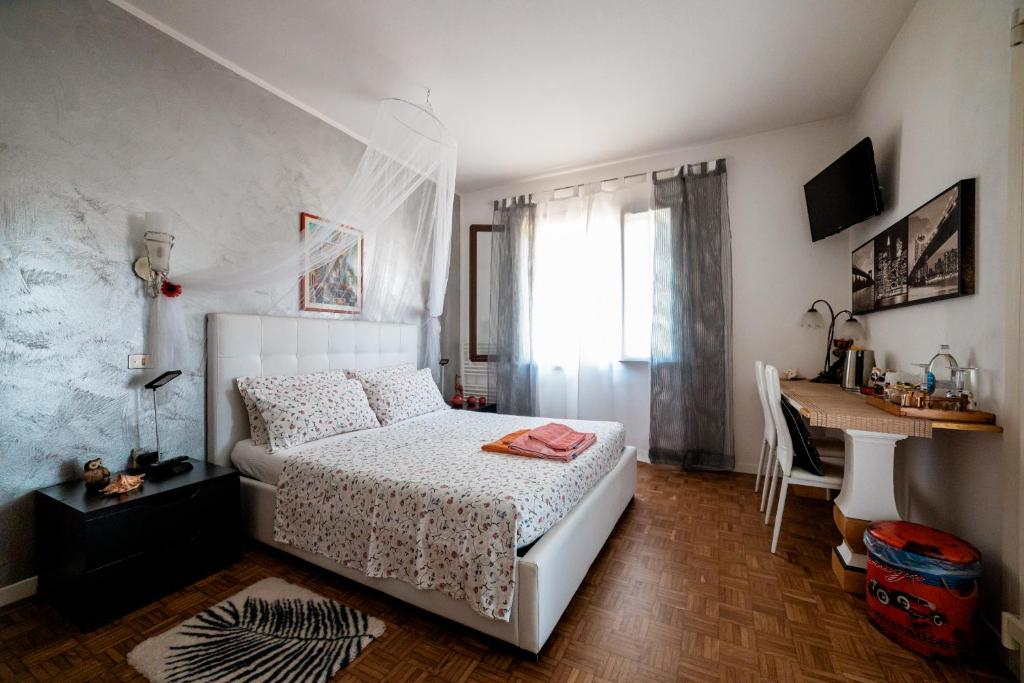 Postel nebo postele na pokoji v ubytování B&B Sweet Dreams