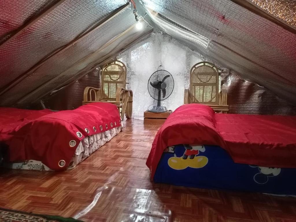 Postel nebo postele na pokoji v ubytování D Sanctum Resort