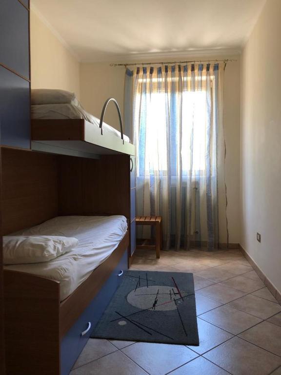Postel nebo postele na pokoji v ubytování Domus Caruso