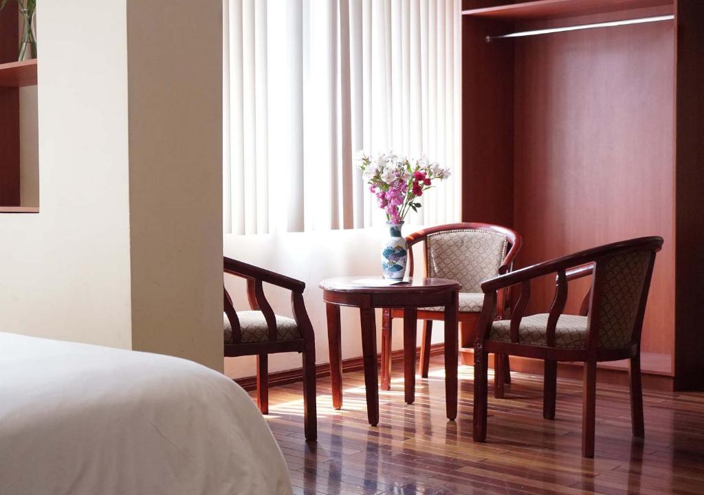 Postel nebo postele na pokoji v ubytování Hotel Lottus