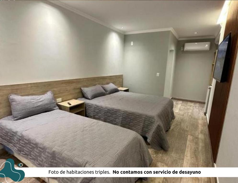 Postel nebo postele na pokoji v ubytování Z Hotel Boutique