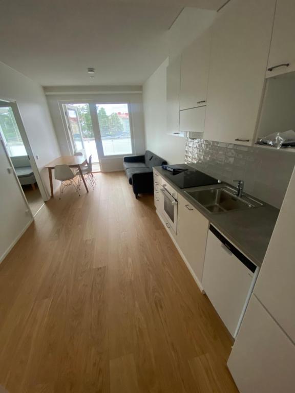 Kuchyň nebo kuchyňský kout v ubytování Scandinavia Apartment Aapo