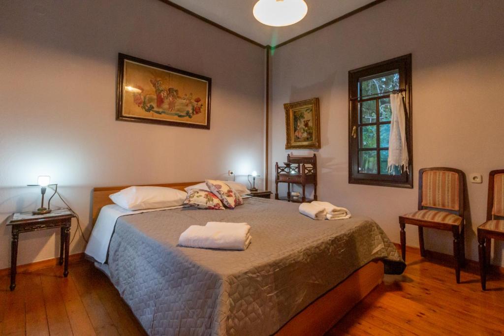 Postel nebo postele na pokoji v ubytování Thalia's Abode