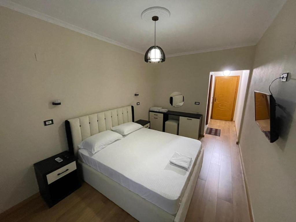 Postel nebo postele na pokoji v ubytování Hotel Belvedere