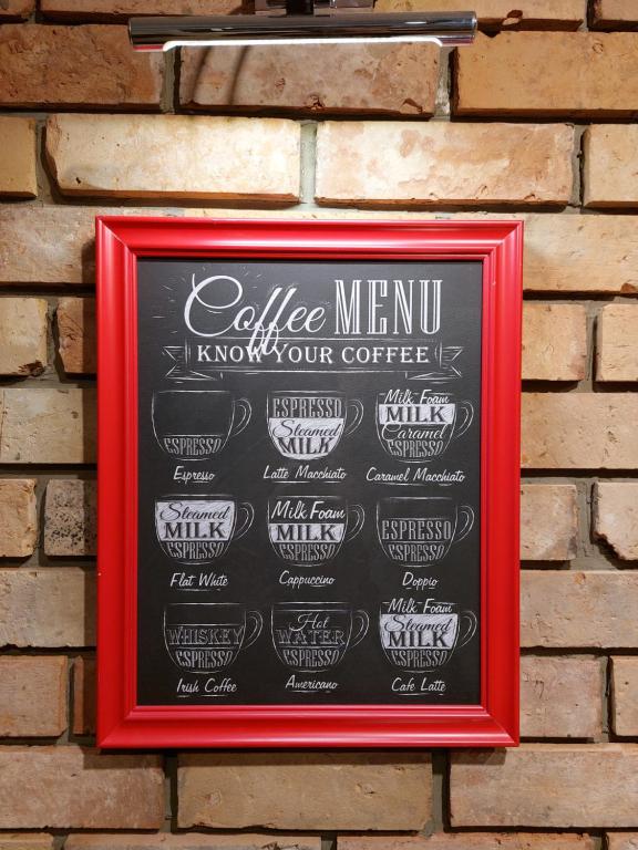 Certifikát, hodnocení, plakát nebo jiný dokument vystavený v ubytování Coffee House