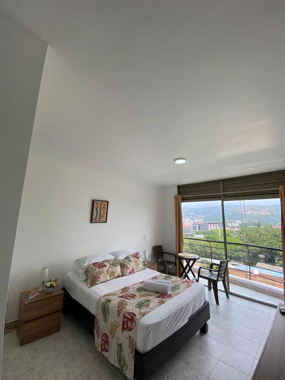 Letto o letti in una camera di Caliview Apartahotel Andalaya