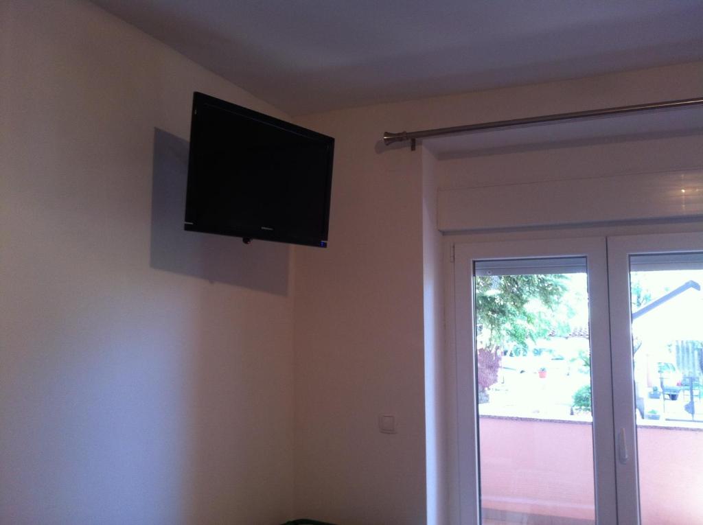 TV a/nebo společenská místnost v ubytování Villa Marija
