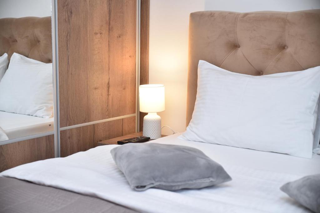 Voodi või voodid majutusasutuse Aria Club Wellness&Spa Zlatibor toas