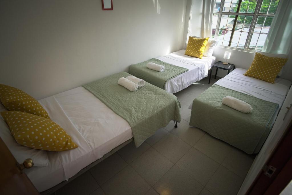 Postel nebo postele na pokoji v ubytování Kilian Beach House