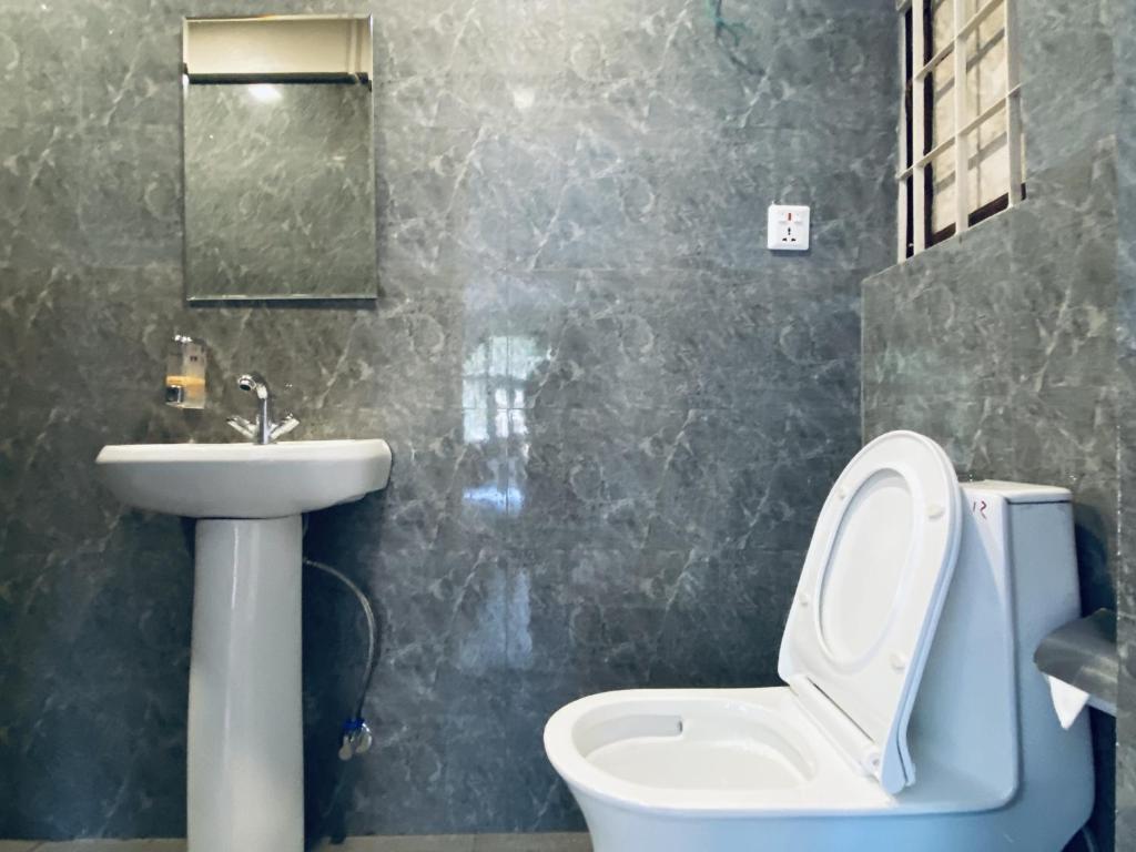 Koupelna v ubytování Hotel Pala