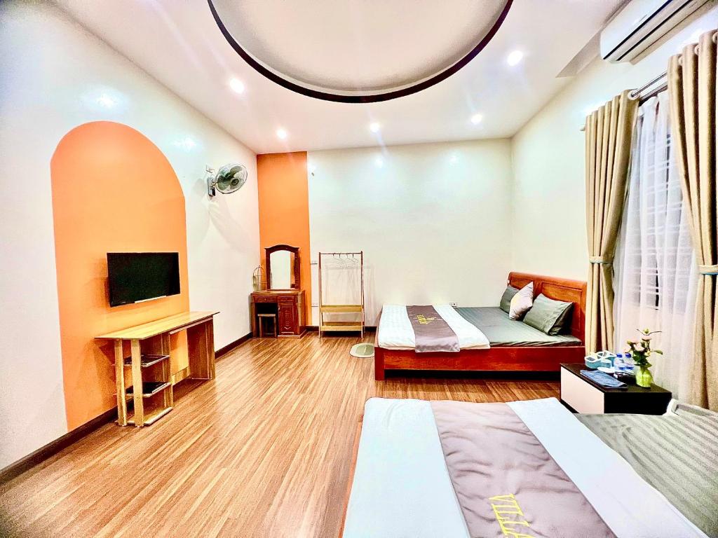 Un pat sau paturi într-o cameră la Chelsea Villa Moc Chau Venuestay