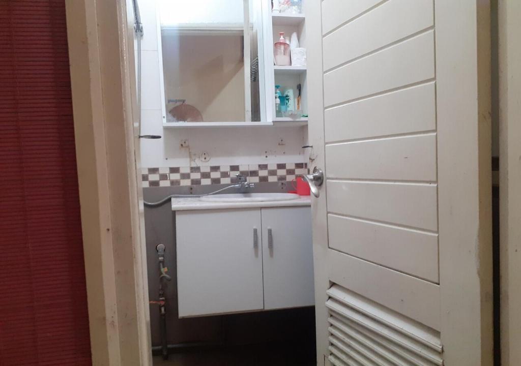 Kuchyň nebo kuchyňský kout v ubytování simple 14 nha chung