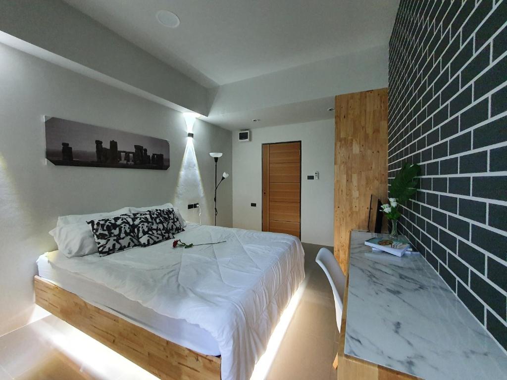 Postel nebo postele na pokoji v ubytování Irich residence South Samrong 6 Kms BTS-Pu Chao