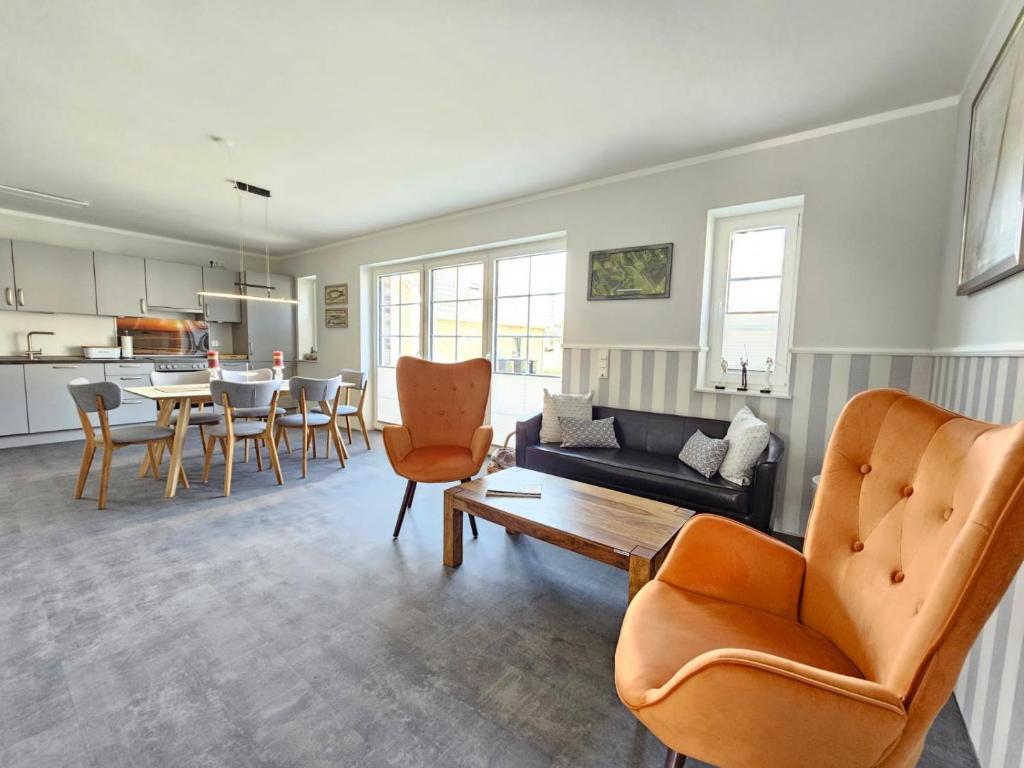 Et opholdsområde på Ferienhaus Golfkate Birdie