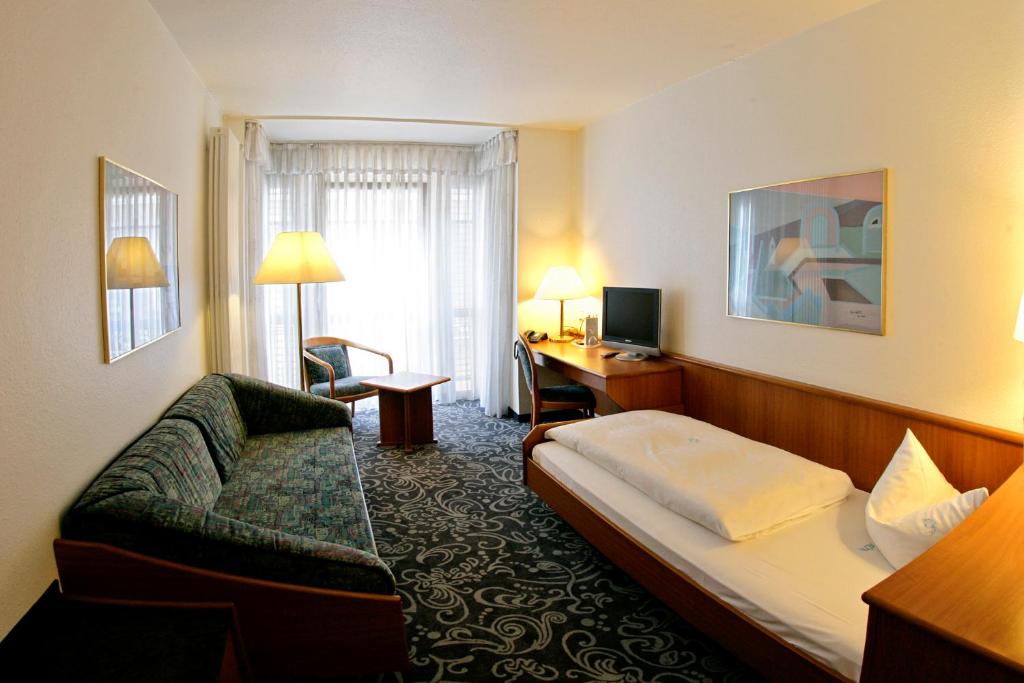 TV a/nebo společenská místnost v ubytování ALFA Hotel - Superior