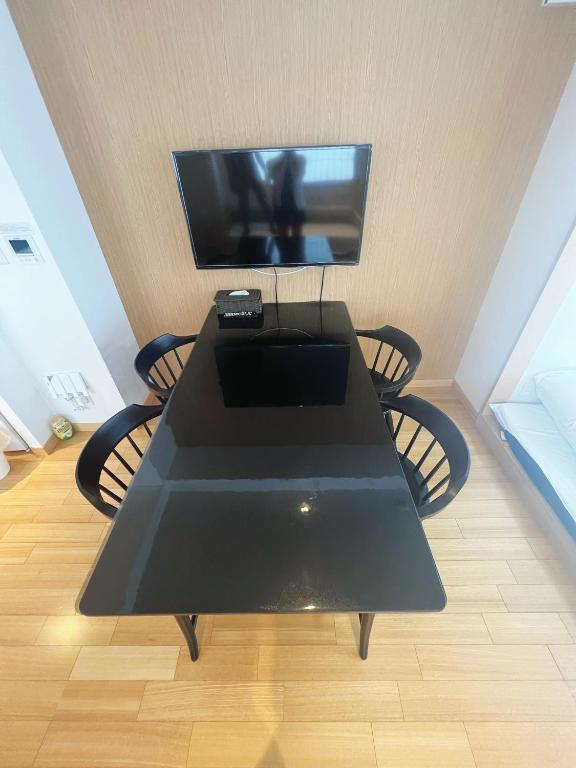 TV a/nebo společenská místnost v ubytování Nplus Tokyo Akihabara Premium