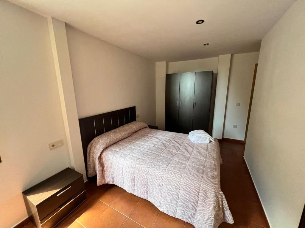 Postel nebo postele na pokoji v ubytování Apartamentos Raíces