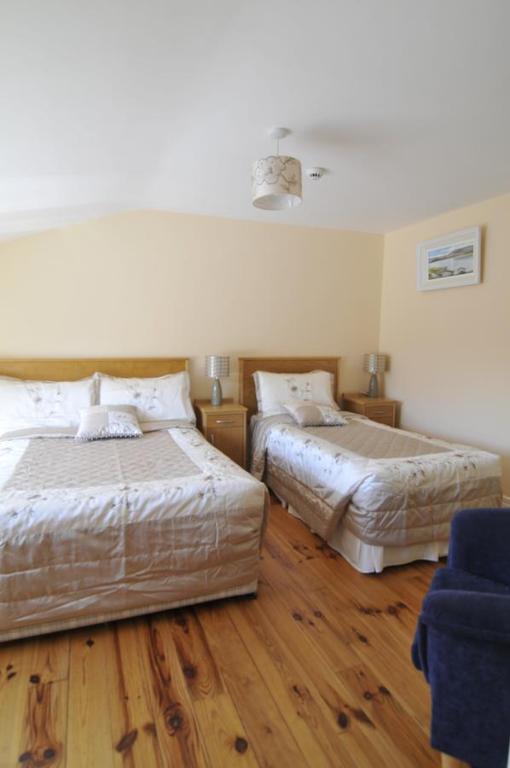 Postel nebo postele na pokoji v ubytování Carrowntober House B & B