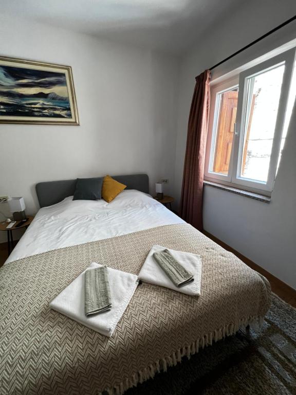 Postel nebo postele na pokoji v ubytování San Marco Rooms Umag