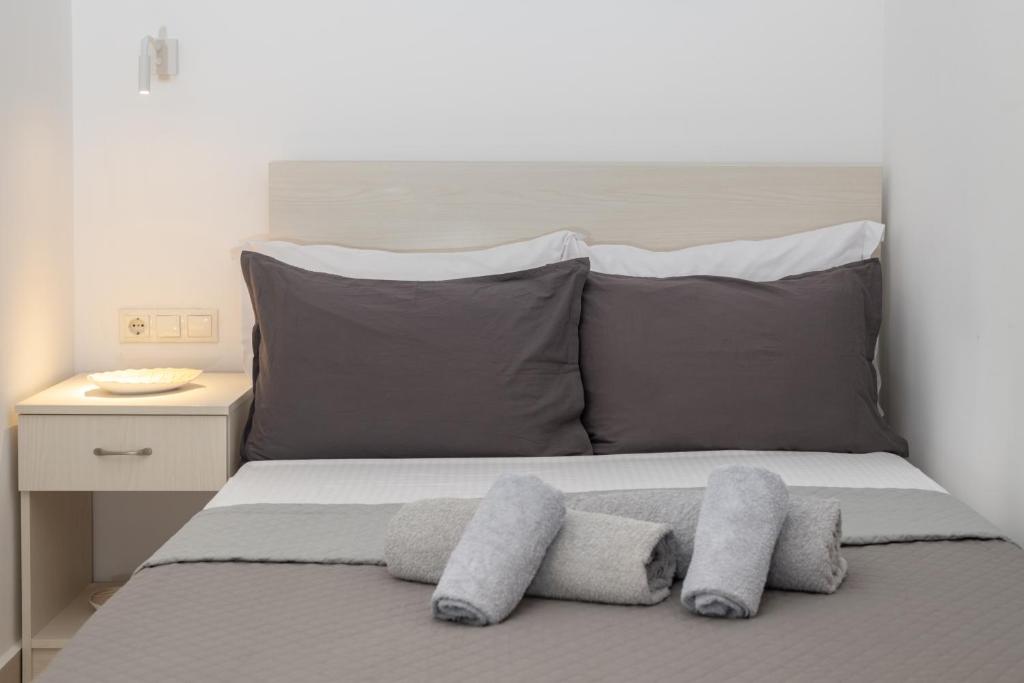 Postel nebo postele na pokoji v ubytování Anassa 9 Cozy Apartment