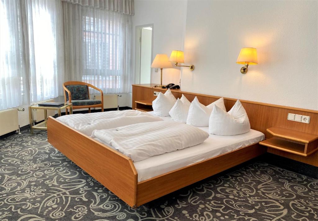 Postel nebo postele na pokoji v ubytování ALFA Hotel - Superior