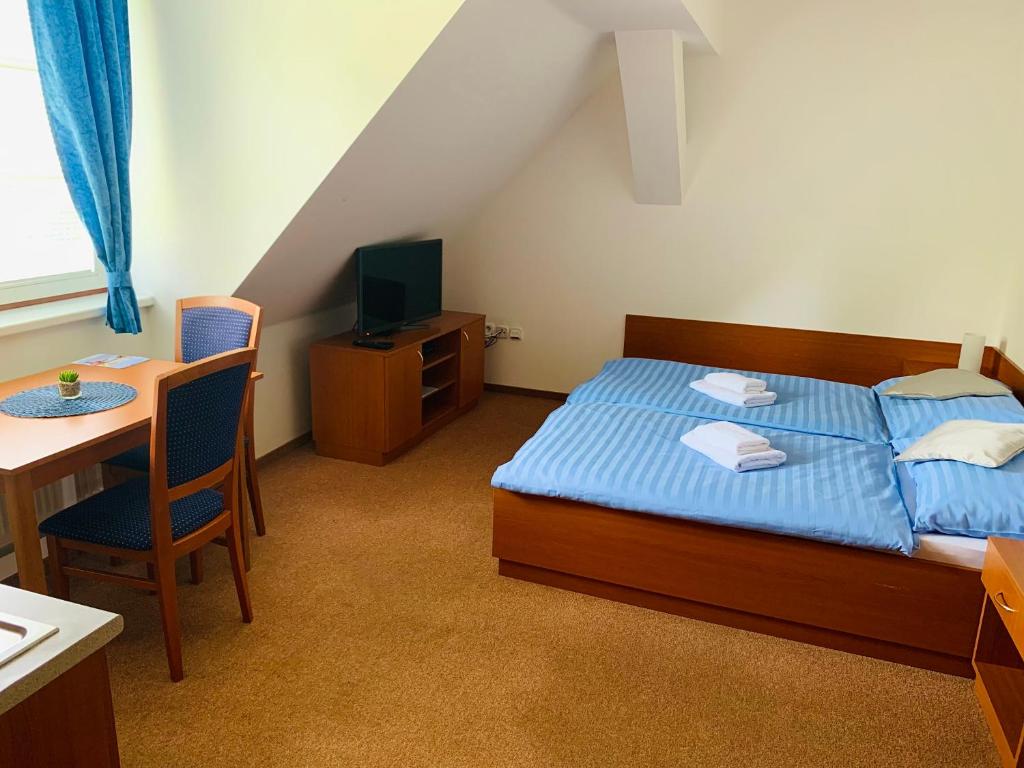 Postel nebo postele na pokoji v ubytování Penzion G