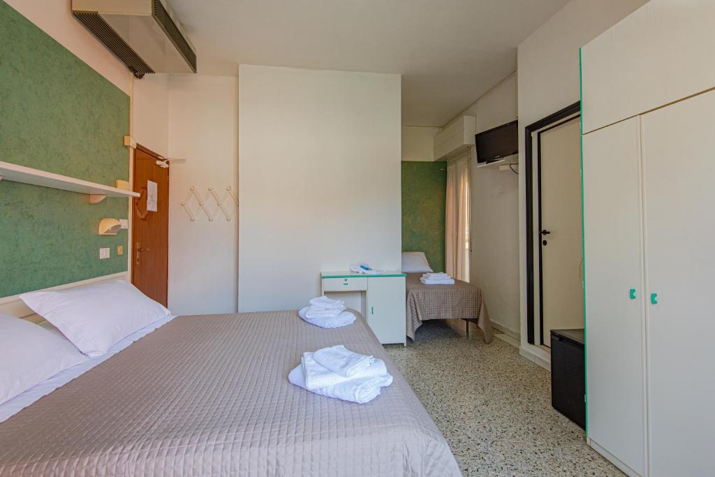 Postel nebo postele na pokoji v ubytování Hotel Baltic