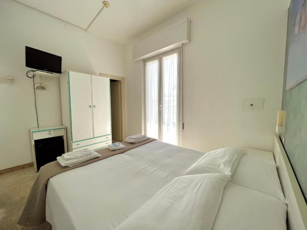 Postel nebo postele na pokoji v ubytování Hotel Baltic