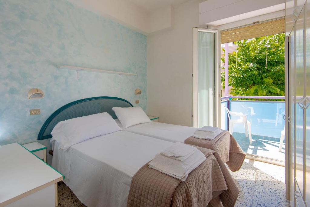 Postel nebo postele na pokoji v ubytování Hotel Baltic