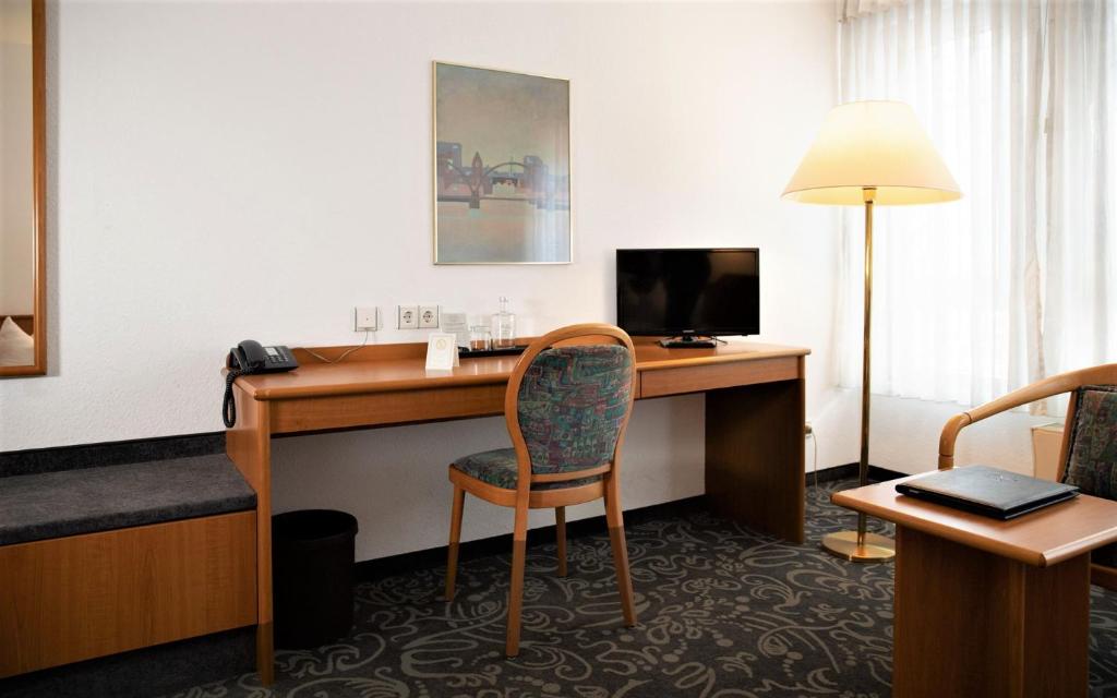 TV a/nebo společenská místnost v ubytování ALFA Hotel - Superior